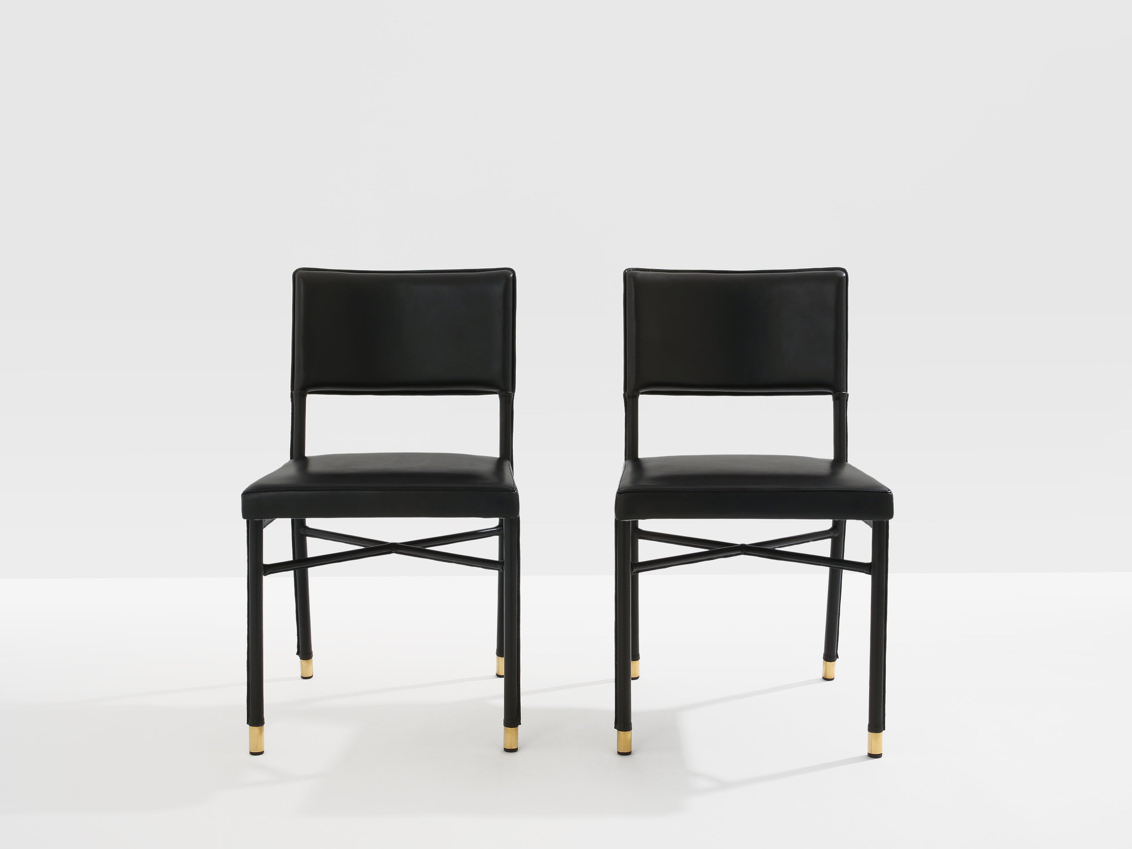 Jacques Quinet pair of saddle-stitched leather brass side chairs 1950