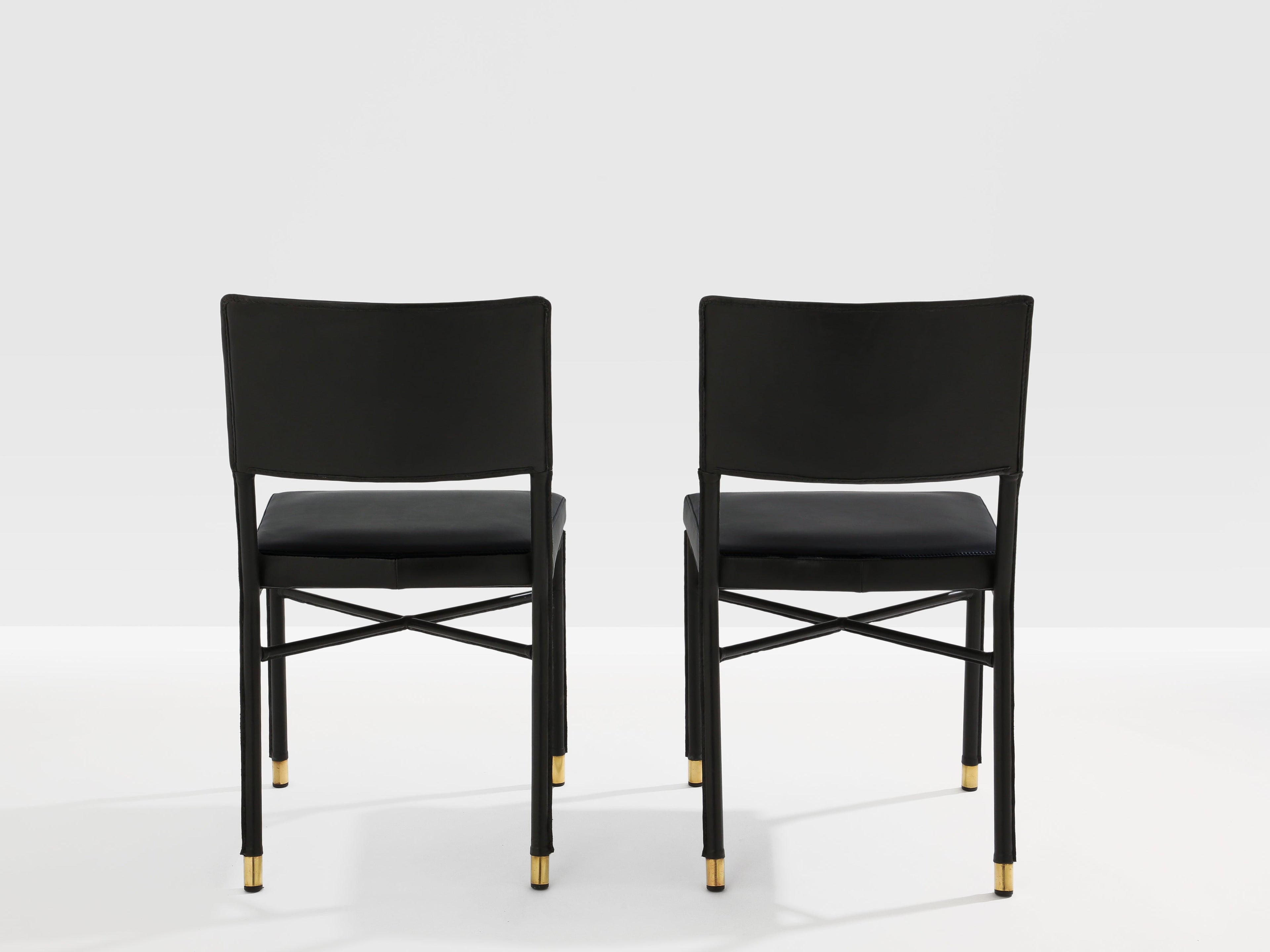 Jacques Quinet pair of saddle-stitched leather brass side chairs 1950