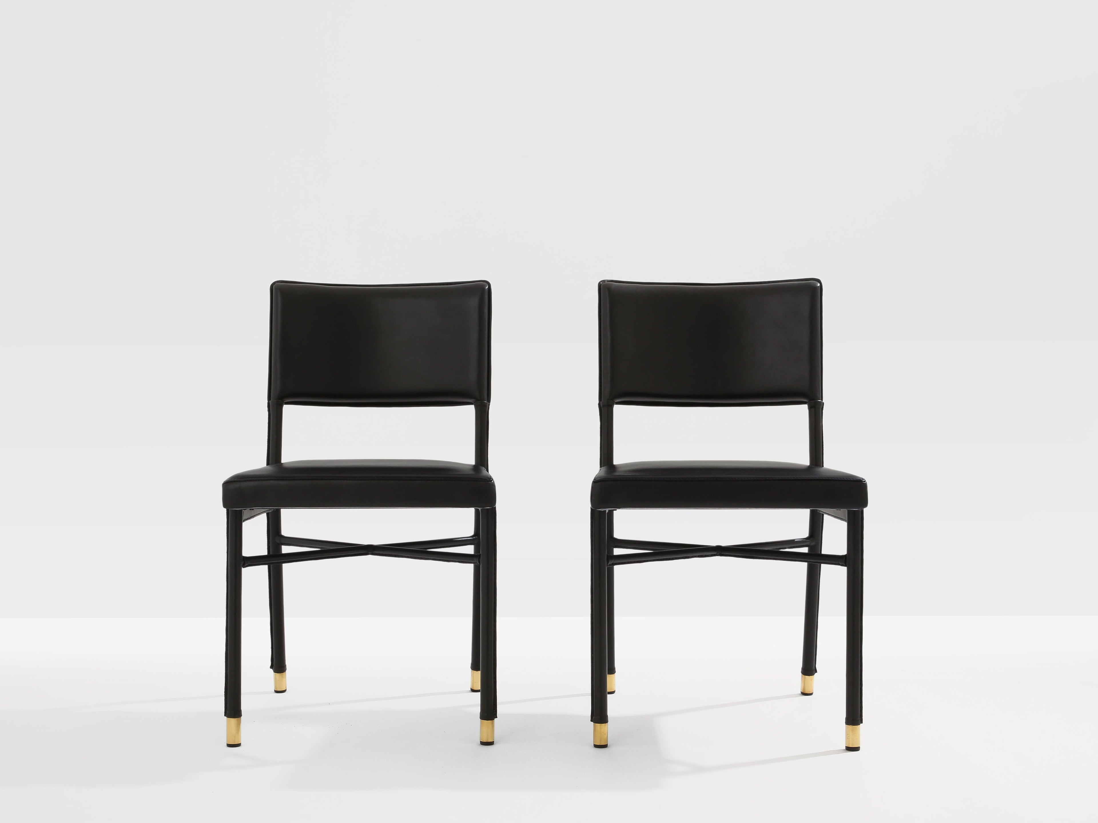 Jacques Quinet pair of saddle-stitched leather brass side chairs 1950