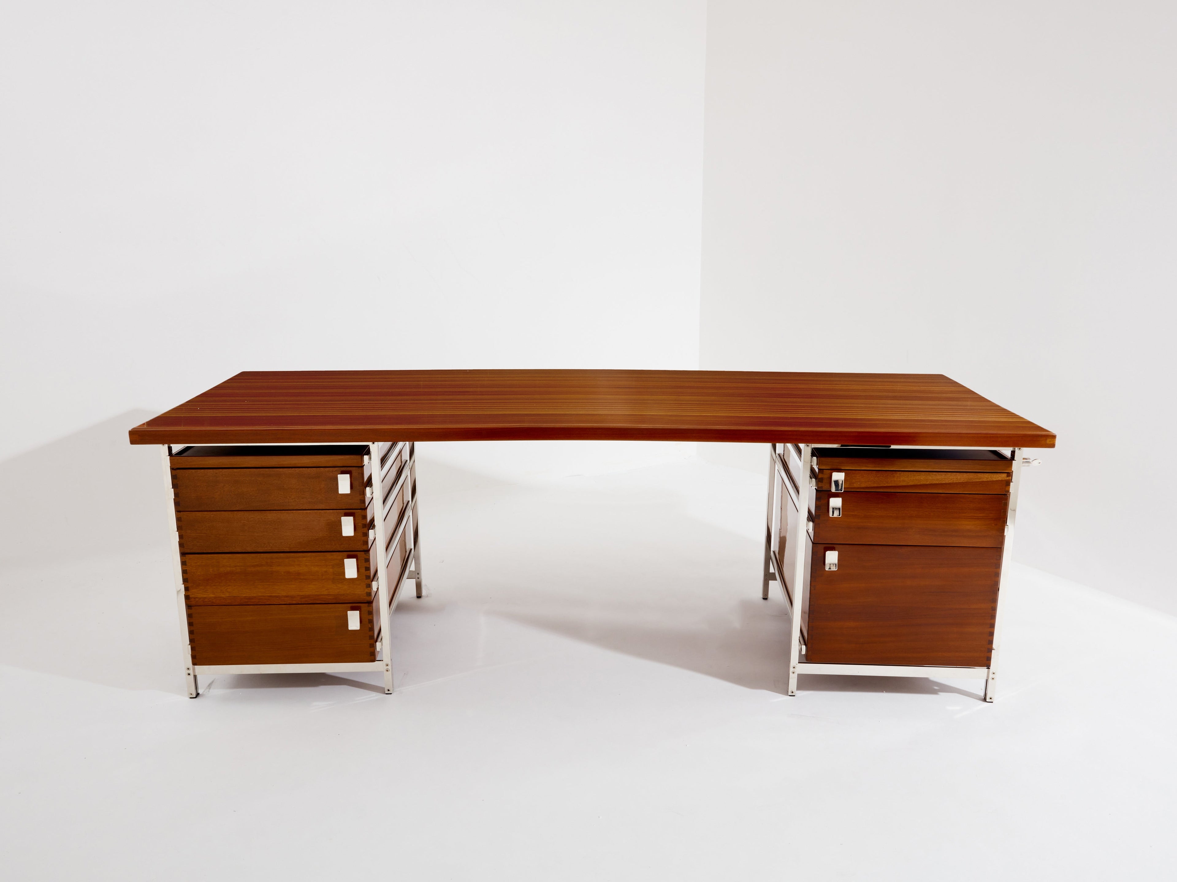 Jules Wabbes curved executive mahogany and jatoba desk 1958