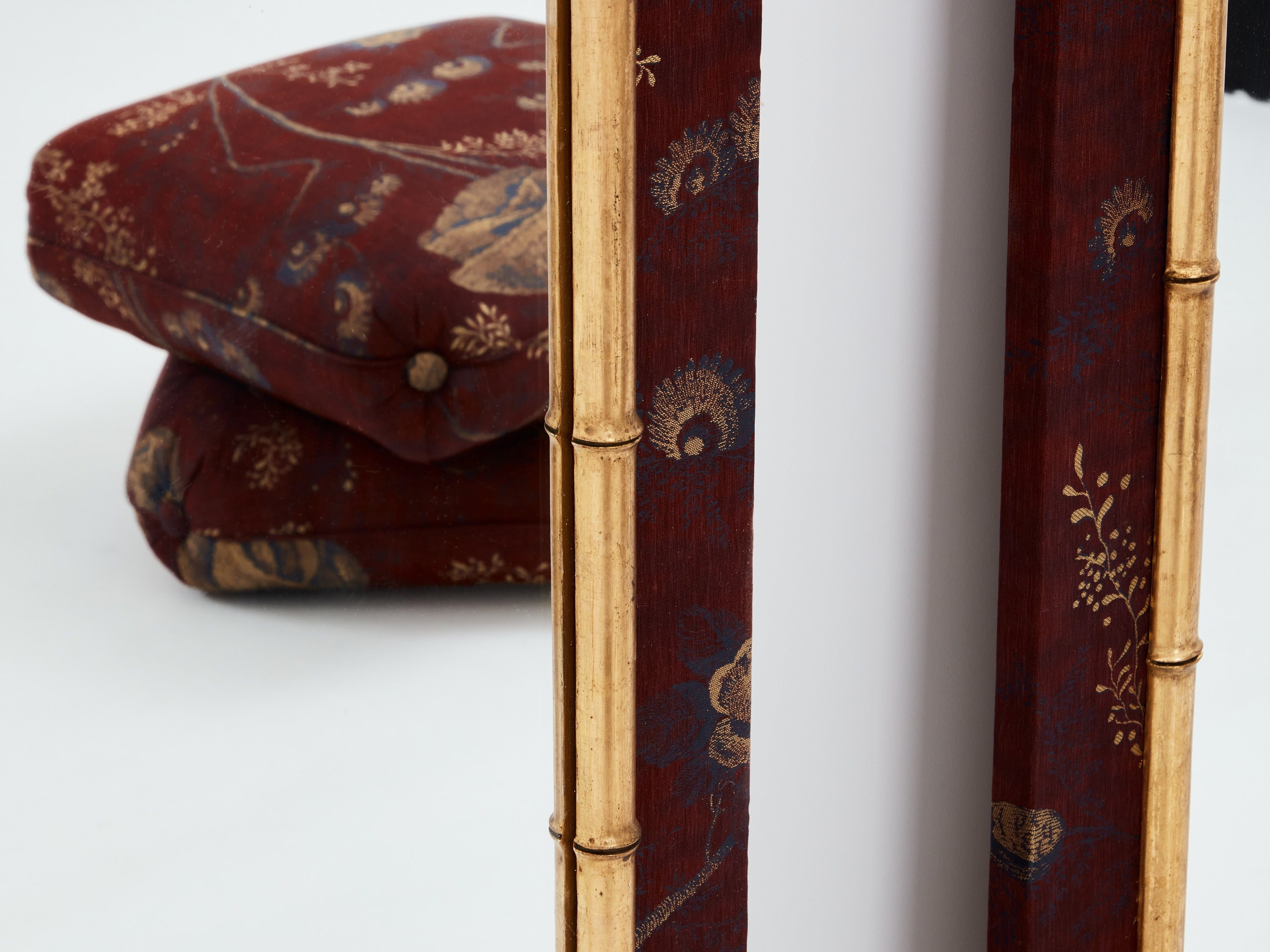 Large pair of French 19th Century gilt faux bamboo upholstery mirrors