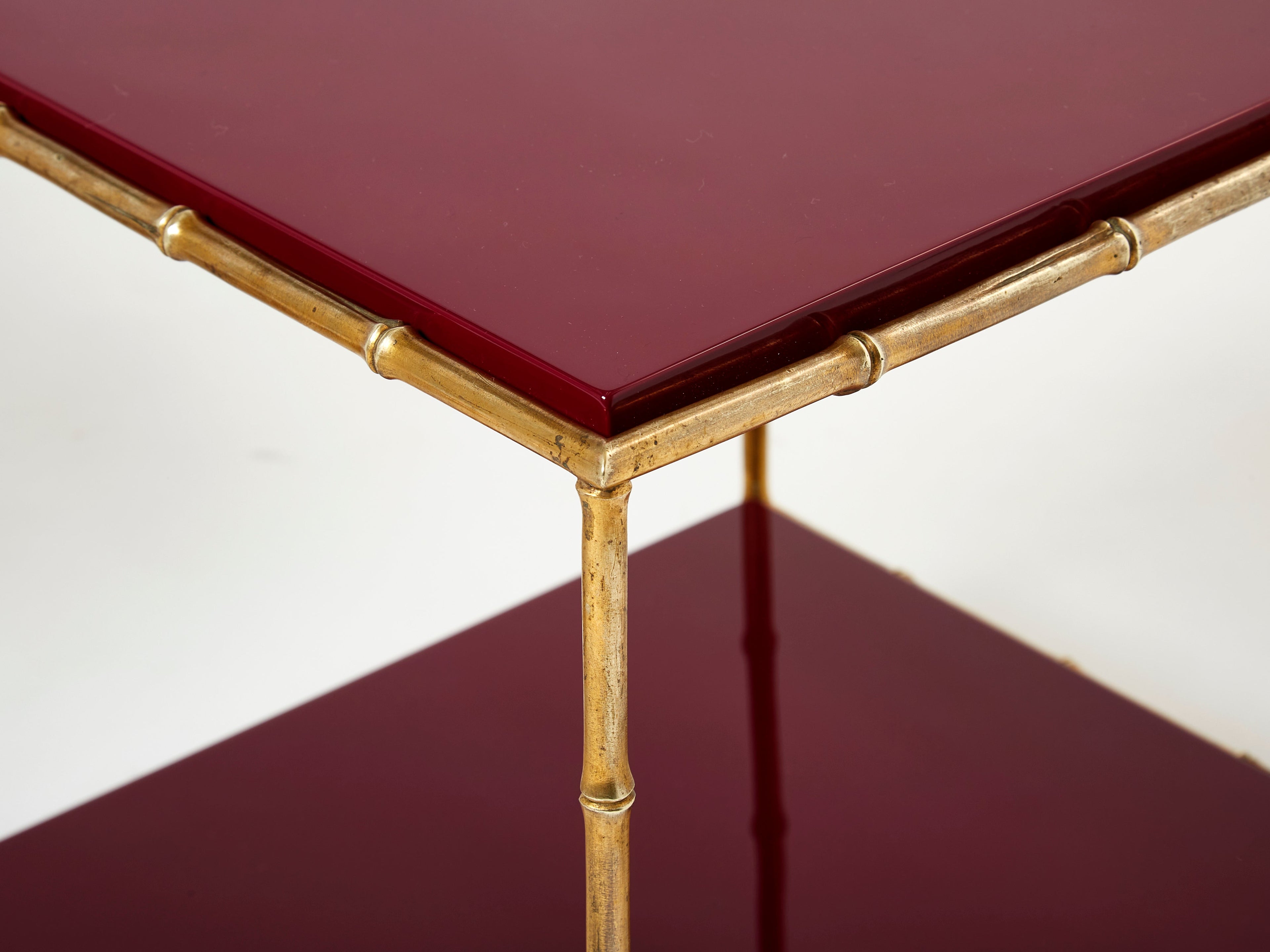 Pair of Maison Baguès bamboo brass red lacquer end tables 1960s