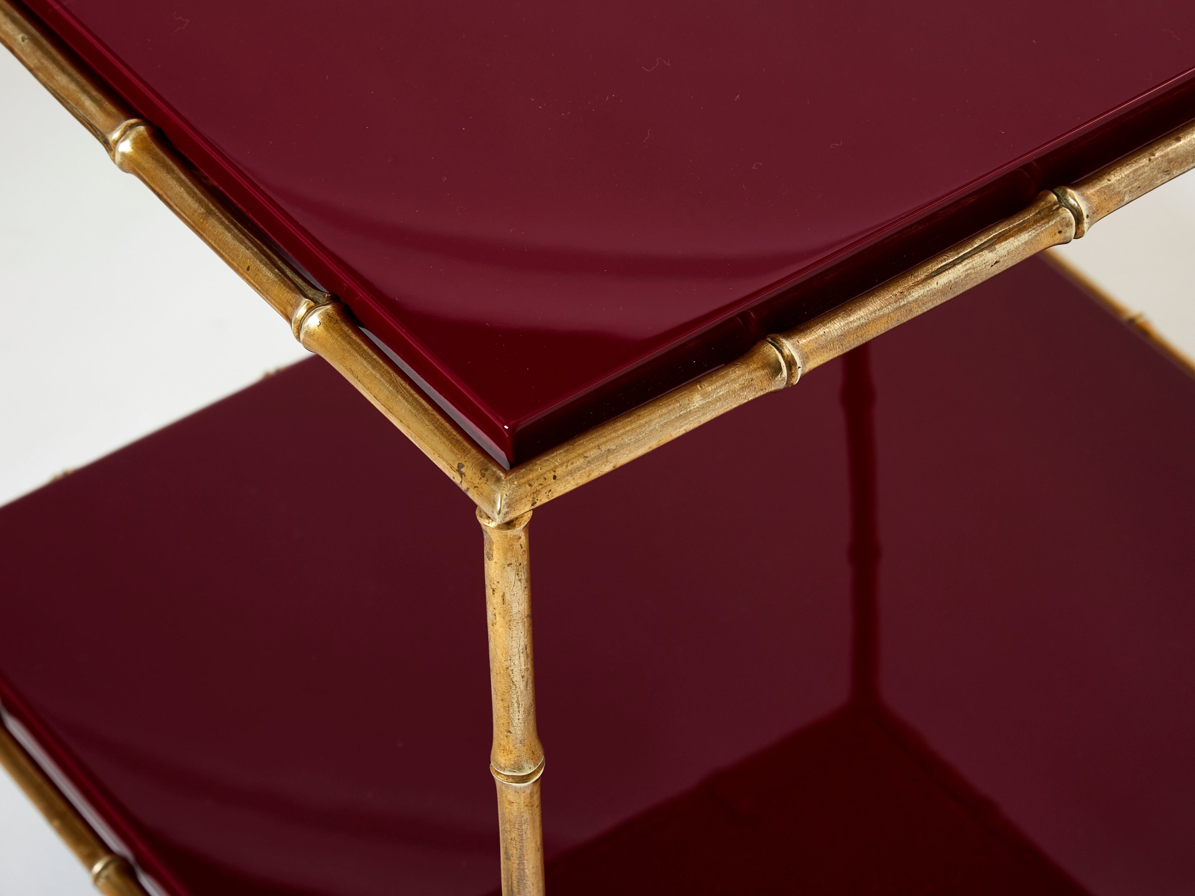 Pair of Maison Baguès bamboo brass red lacquer end tables 1960s