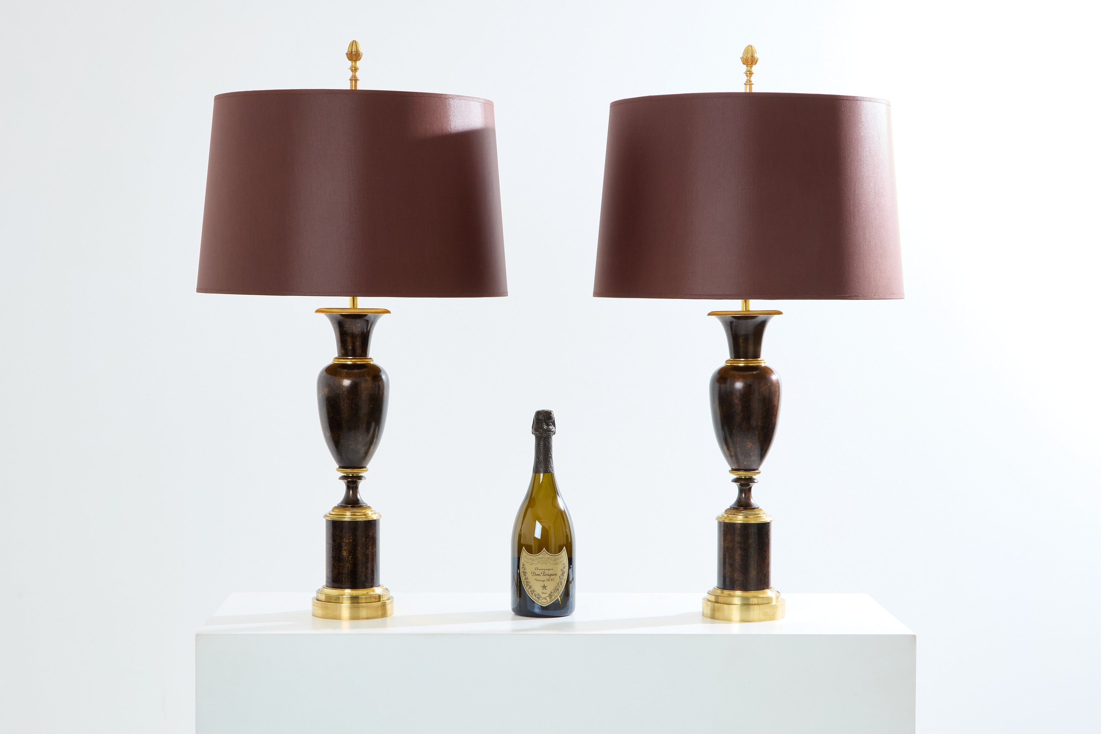 Maison Charles pair of patinated brass lamps 1950s