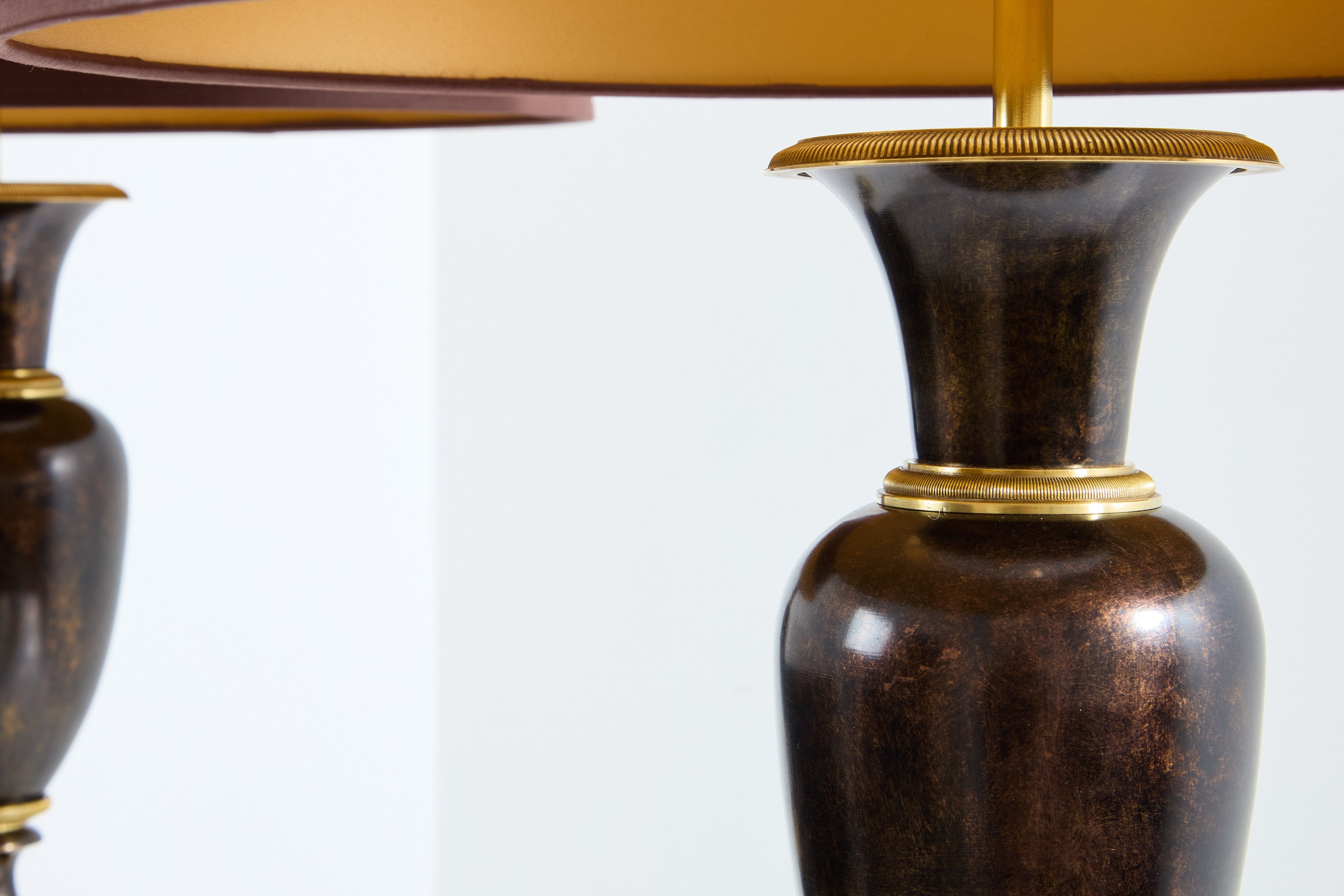 Maison Charles pair of patinated brass lamps 1950s