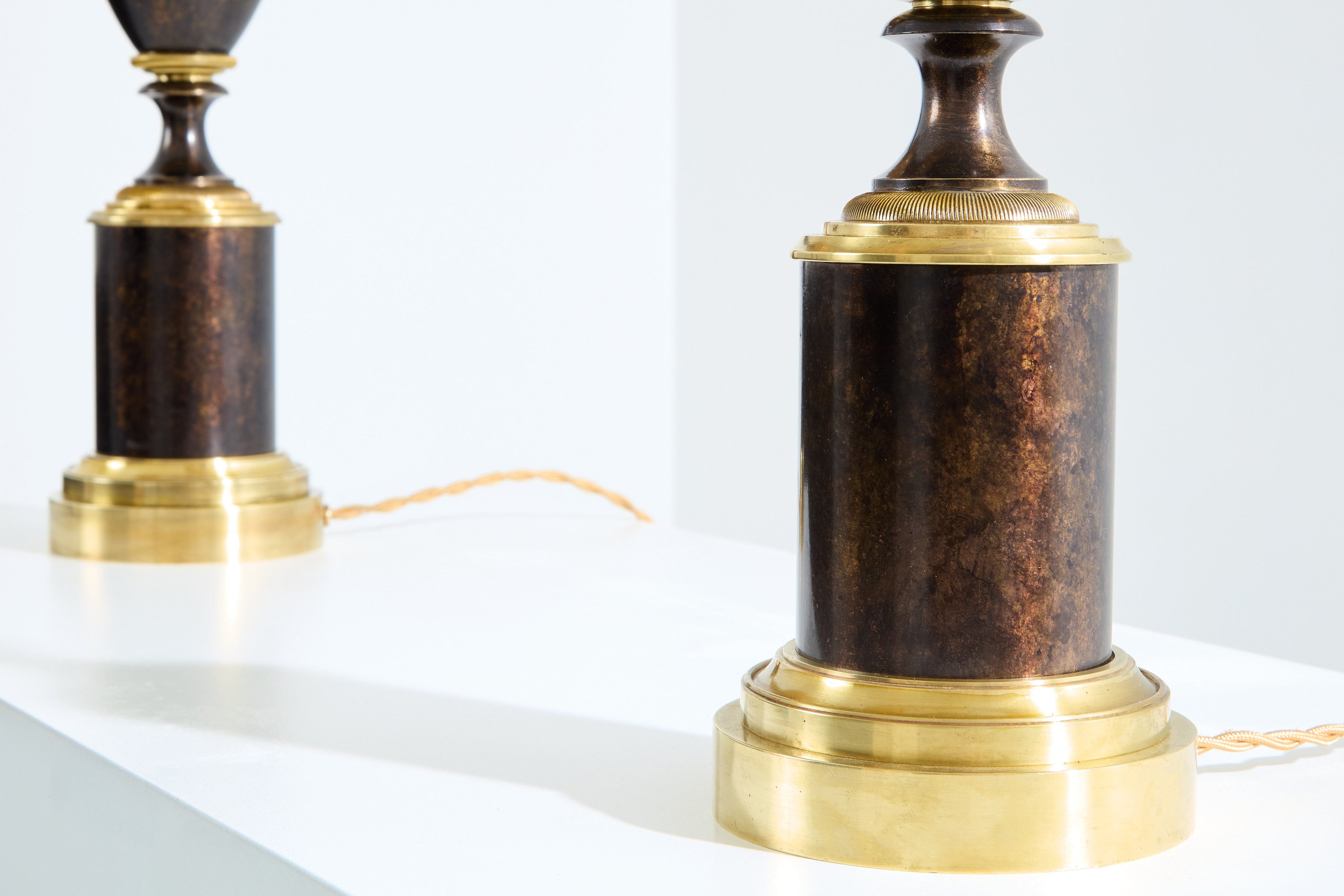 Maison Charles pair of patinated brass lamps 1950s