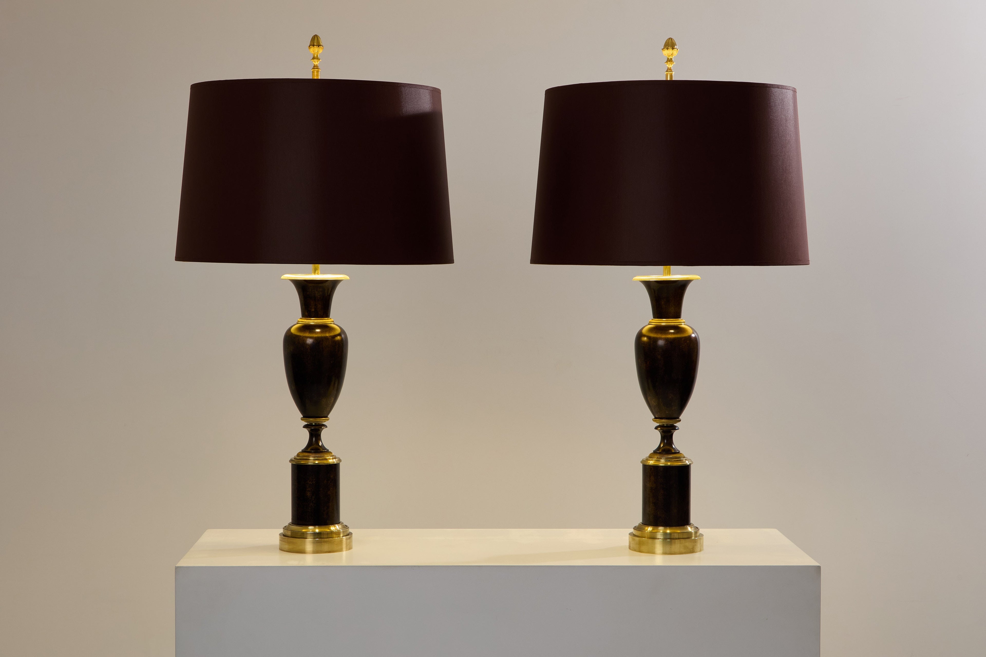 Maison Charles pair of patinated brass lamps 1950s
