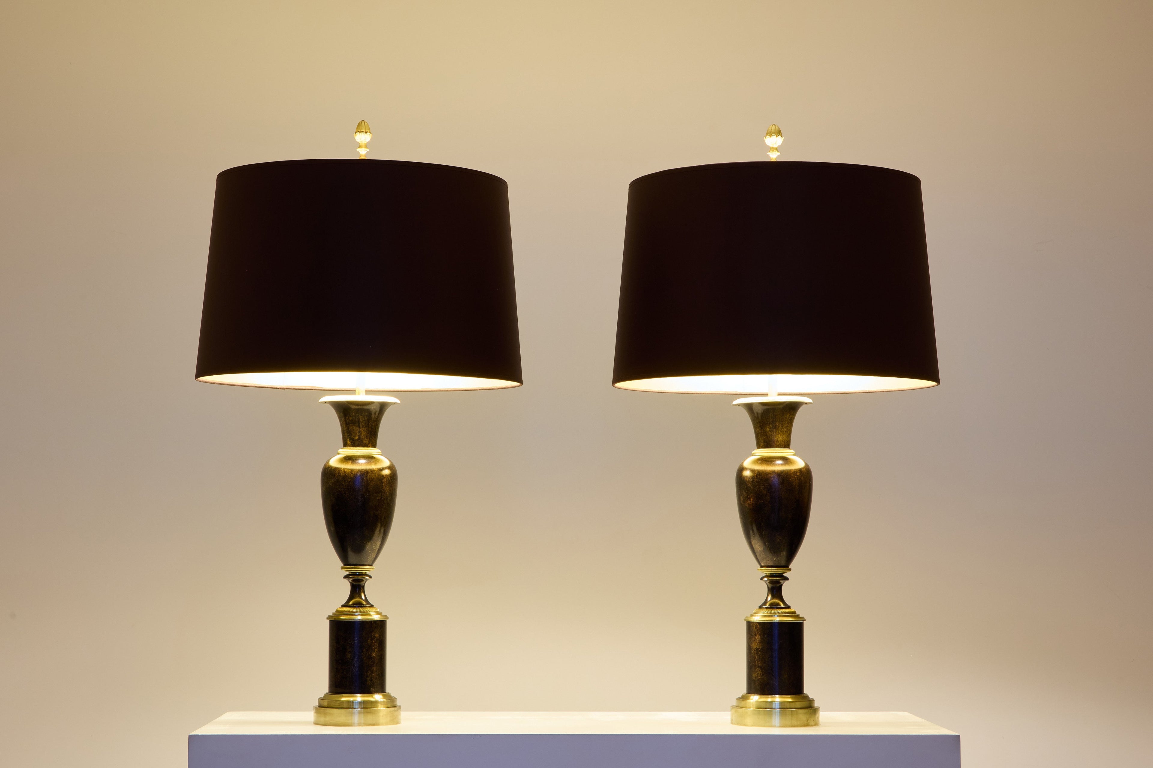 Maison Charles pair of patinated brass lamps 1950s