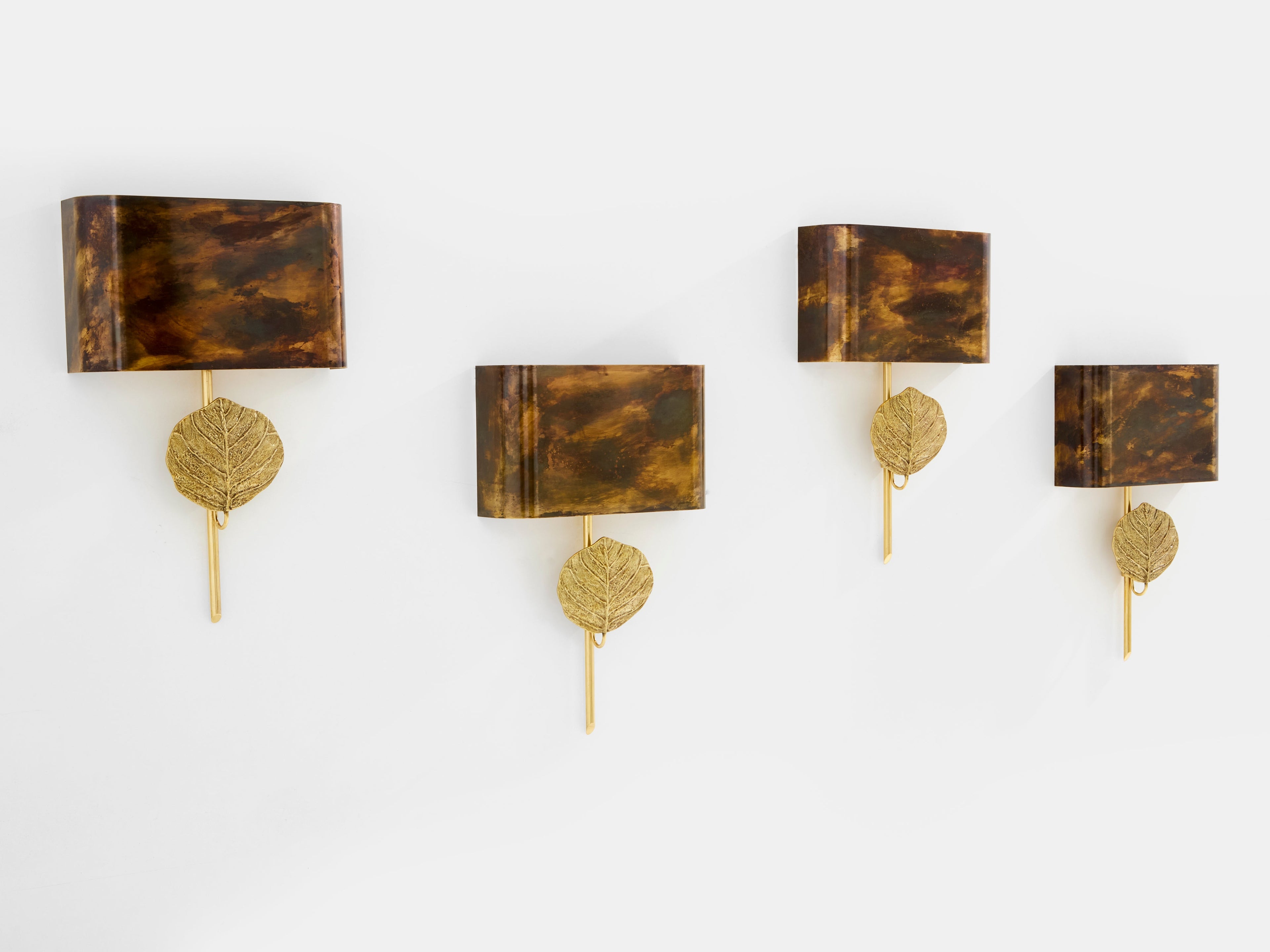 Maison Charles set of four patinated bronze and brass sconces 1970s