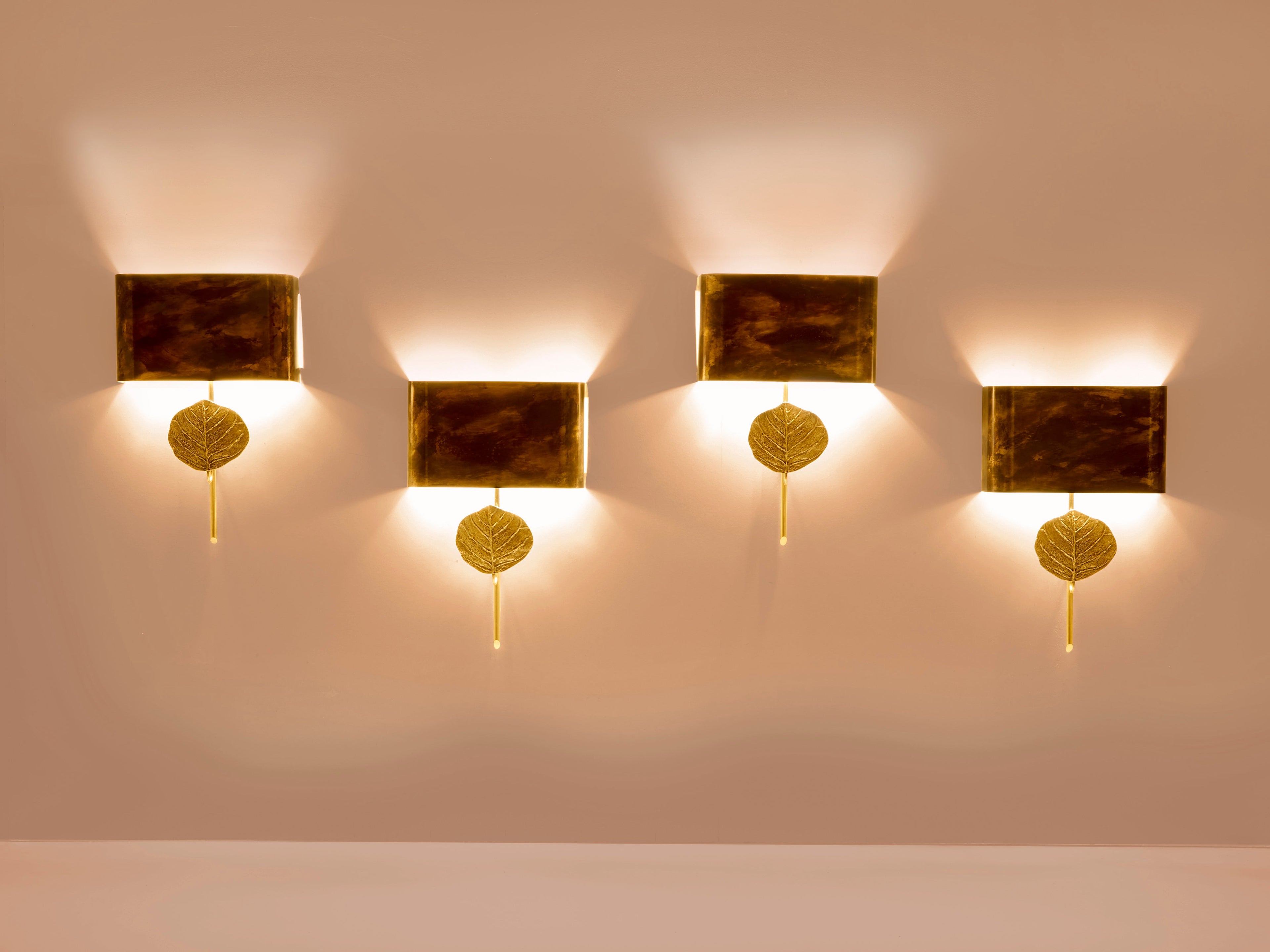 Maison Charles set of four patinated bronze and brass sconces 1970s