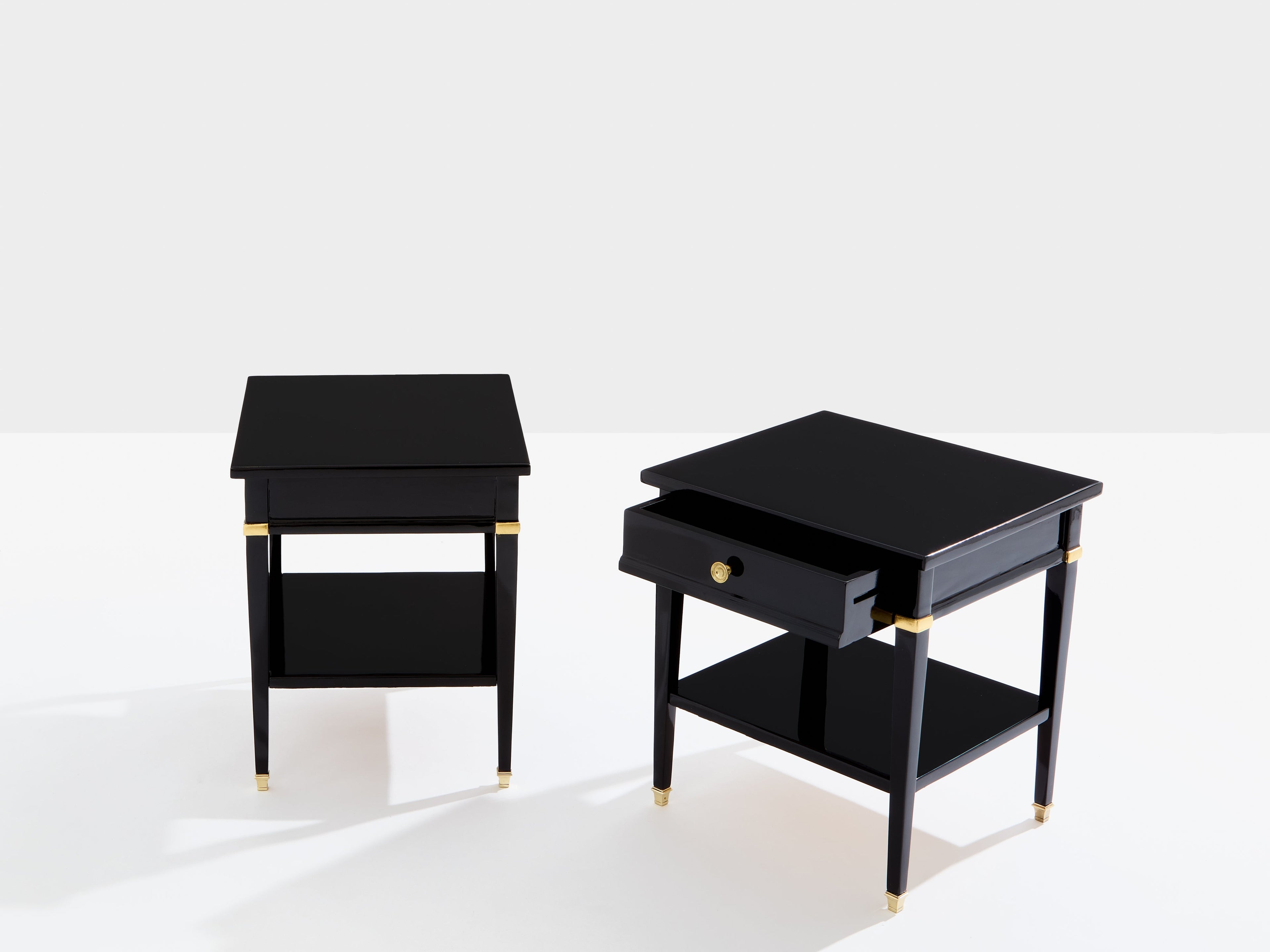 Pair of Maison Jansen black lacquer and brass nightstands 1960s