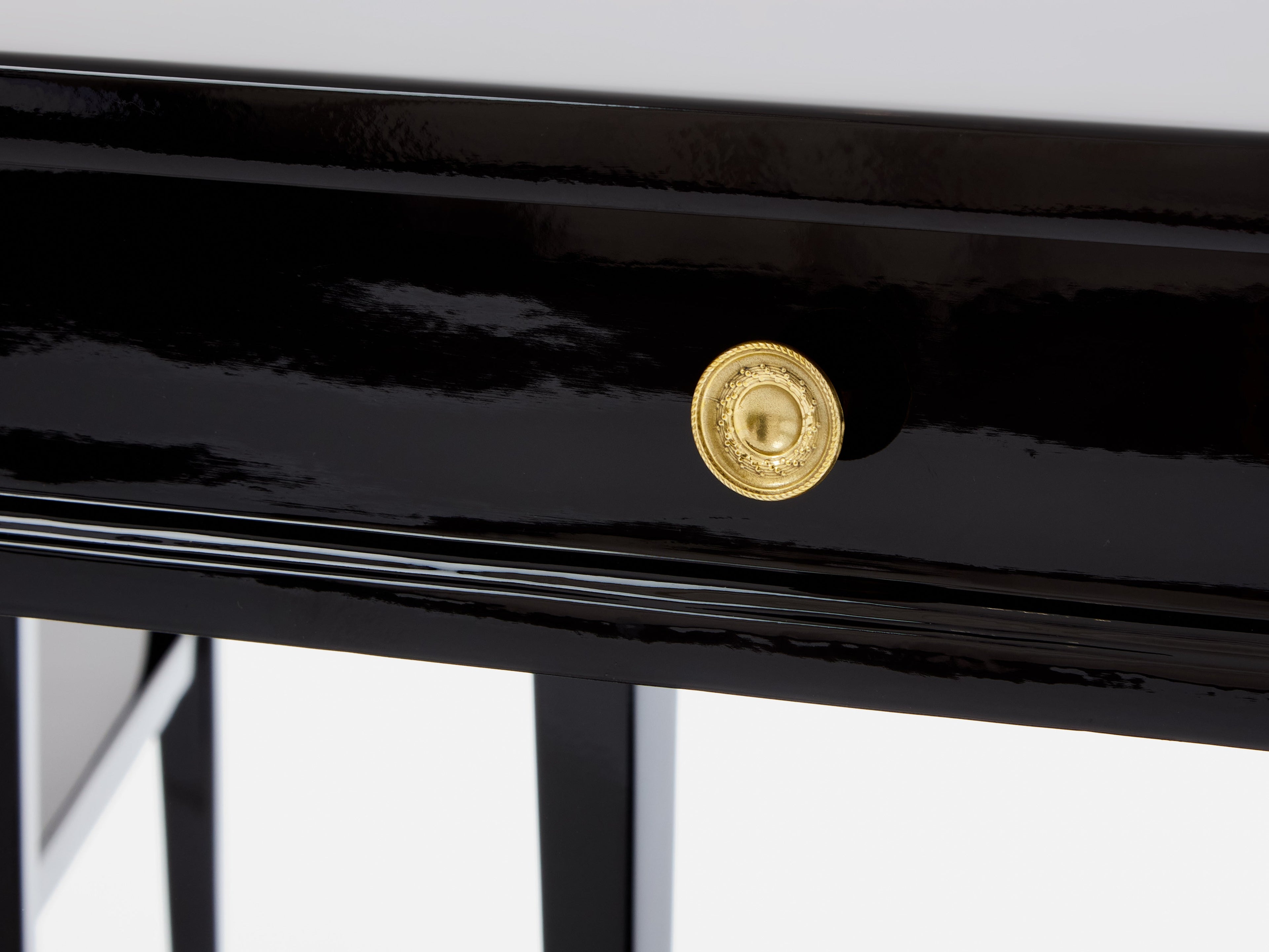 Pair of Maison Jansen black lacquer and brass nightstands 1960s