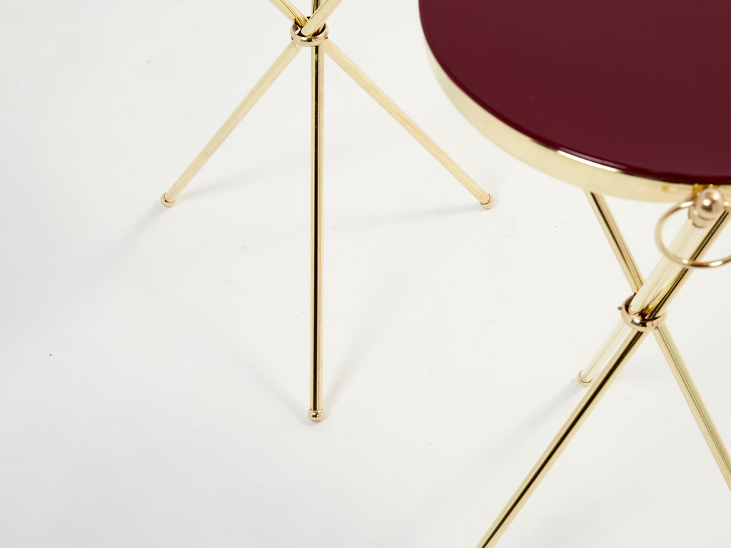 Pair of Maison Jansen brass red lacquer gueridon tables 1960s