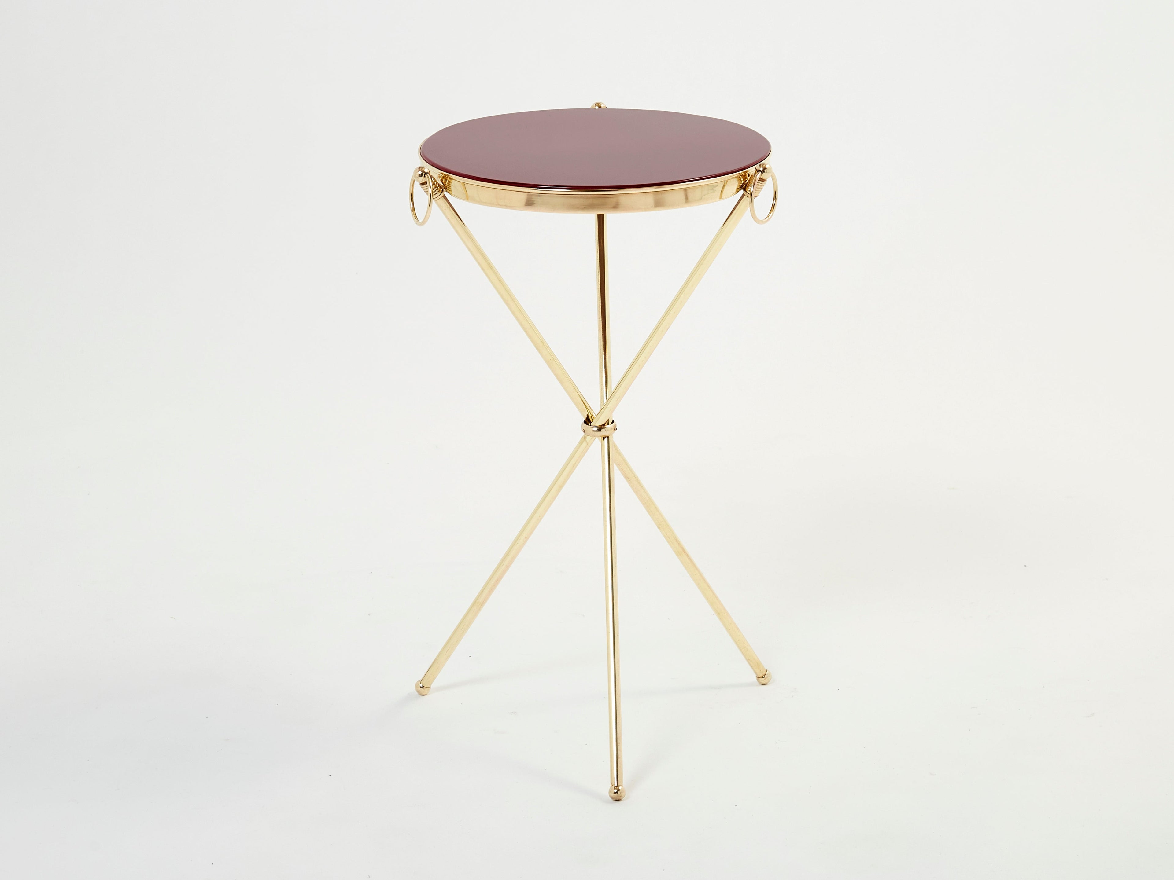 Pair of Maison Jansen brass red lacquer gueridon tables 1960s