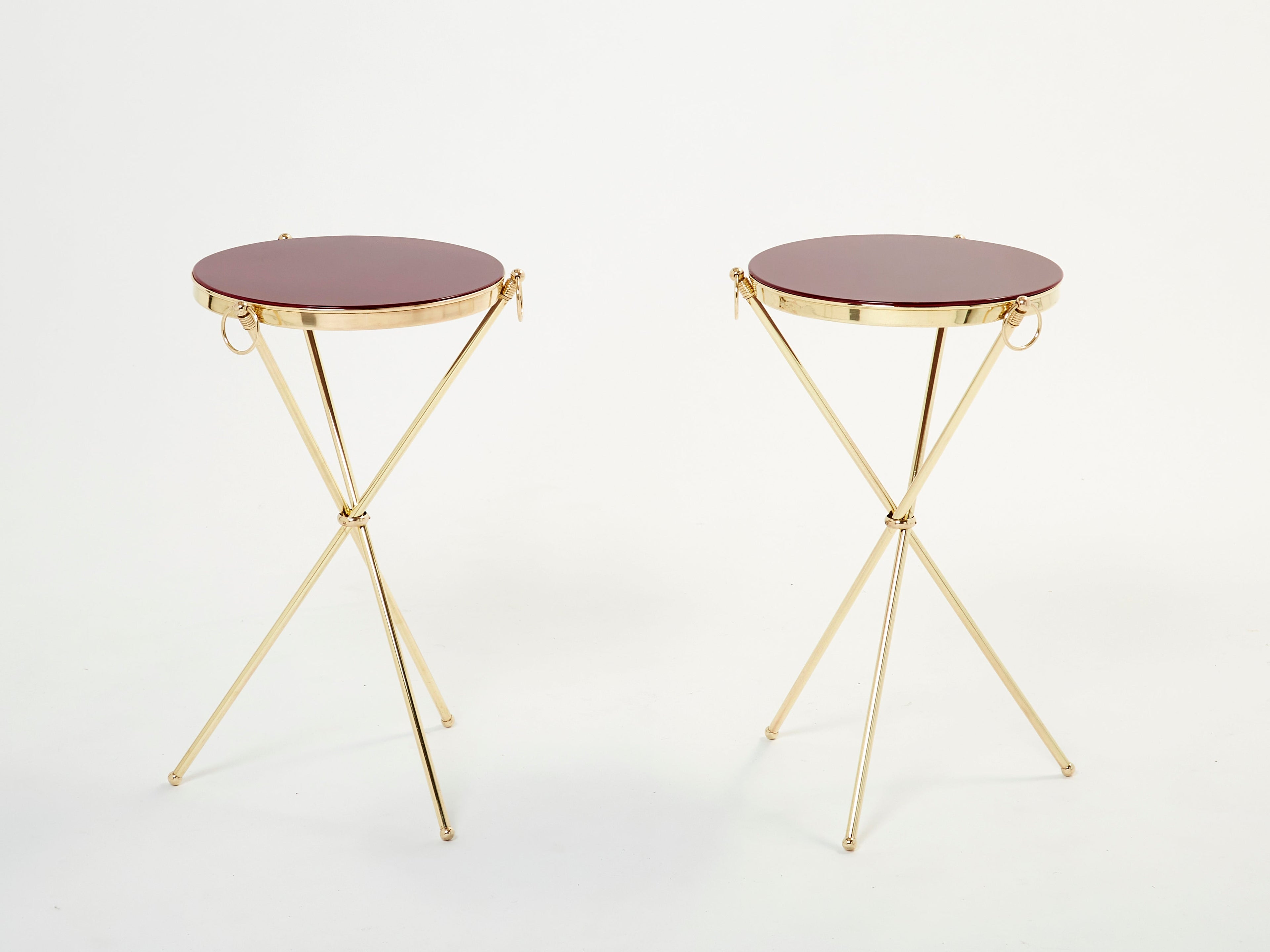 Pair of Maison Jansen brass red lacquer gueridon tables 1960s