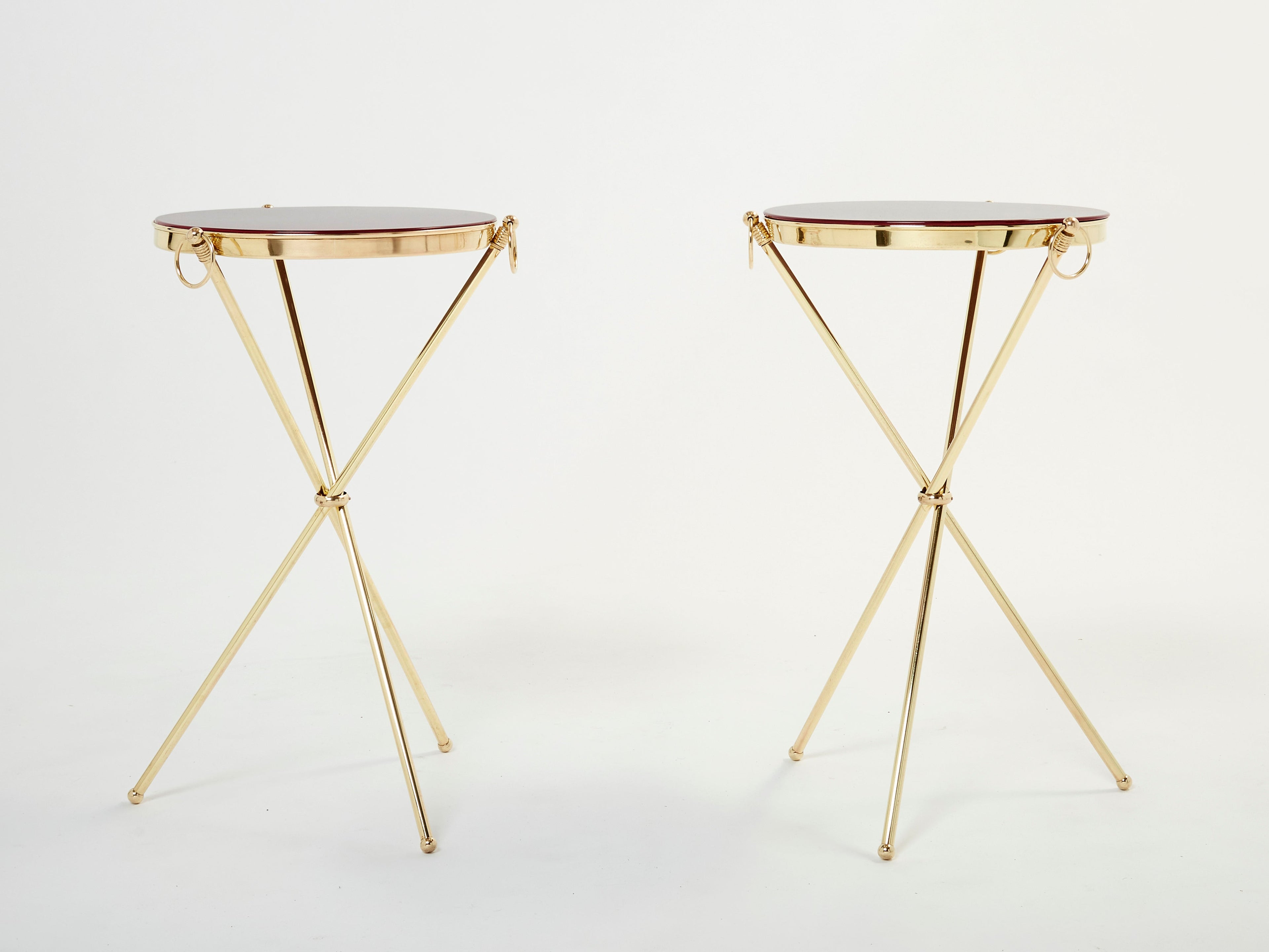 Pair of Maison Jansen brass red lacquer gueridon tables 1960s