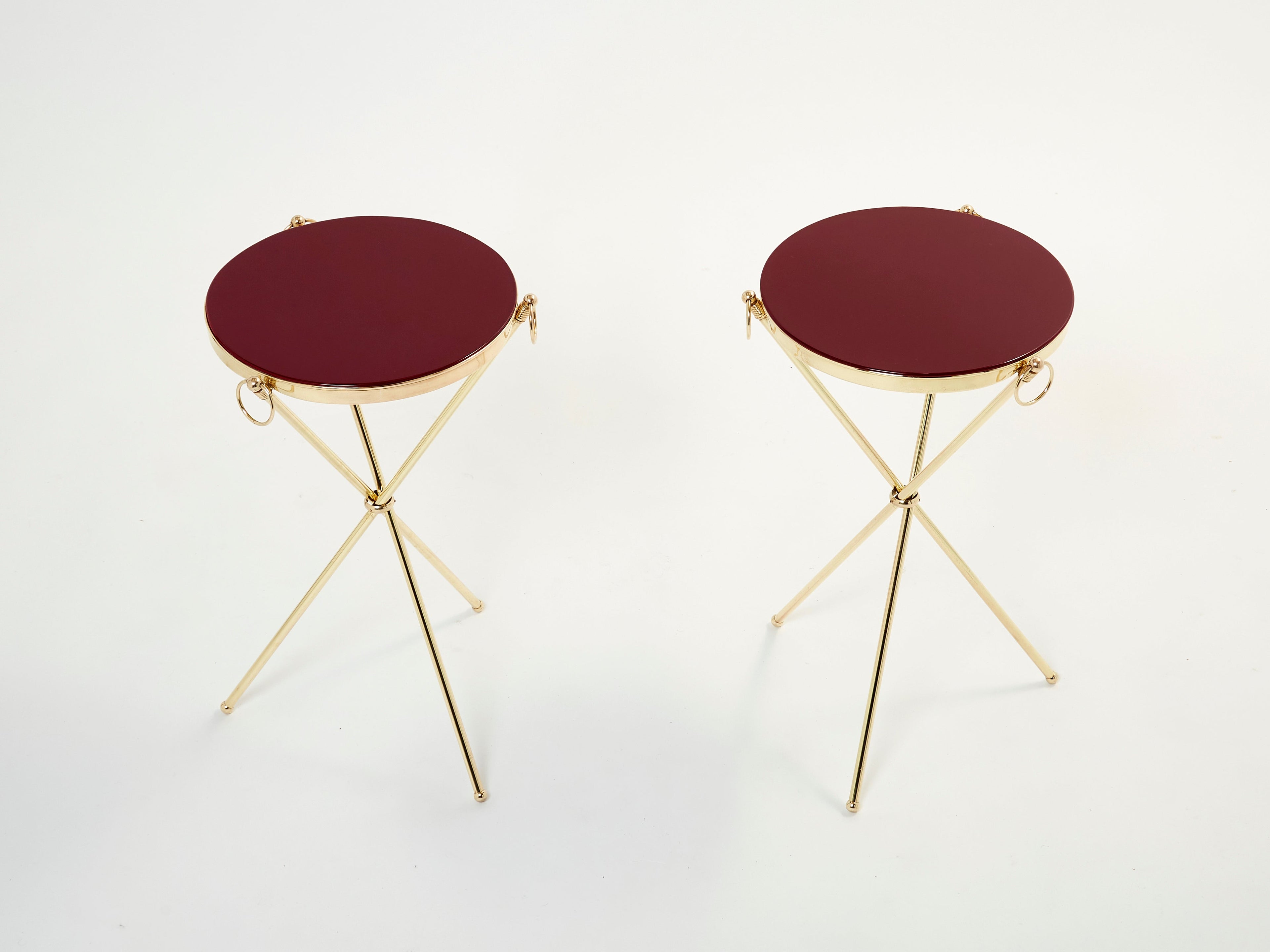 Pair of Maison Jansen brass red lacquer gueridon tables 1960s