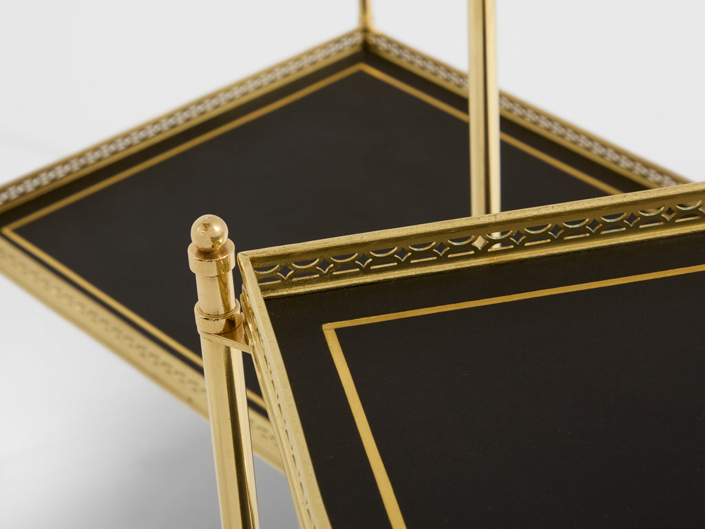 Maison Jansen pair of two-tier side tables brass black leather 1960s