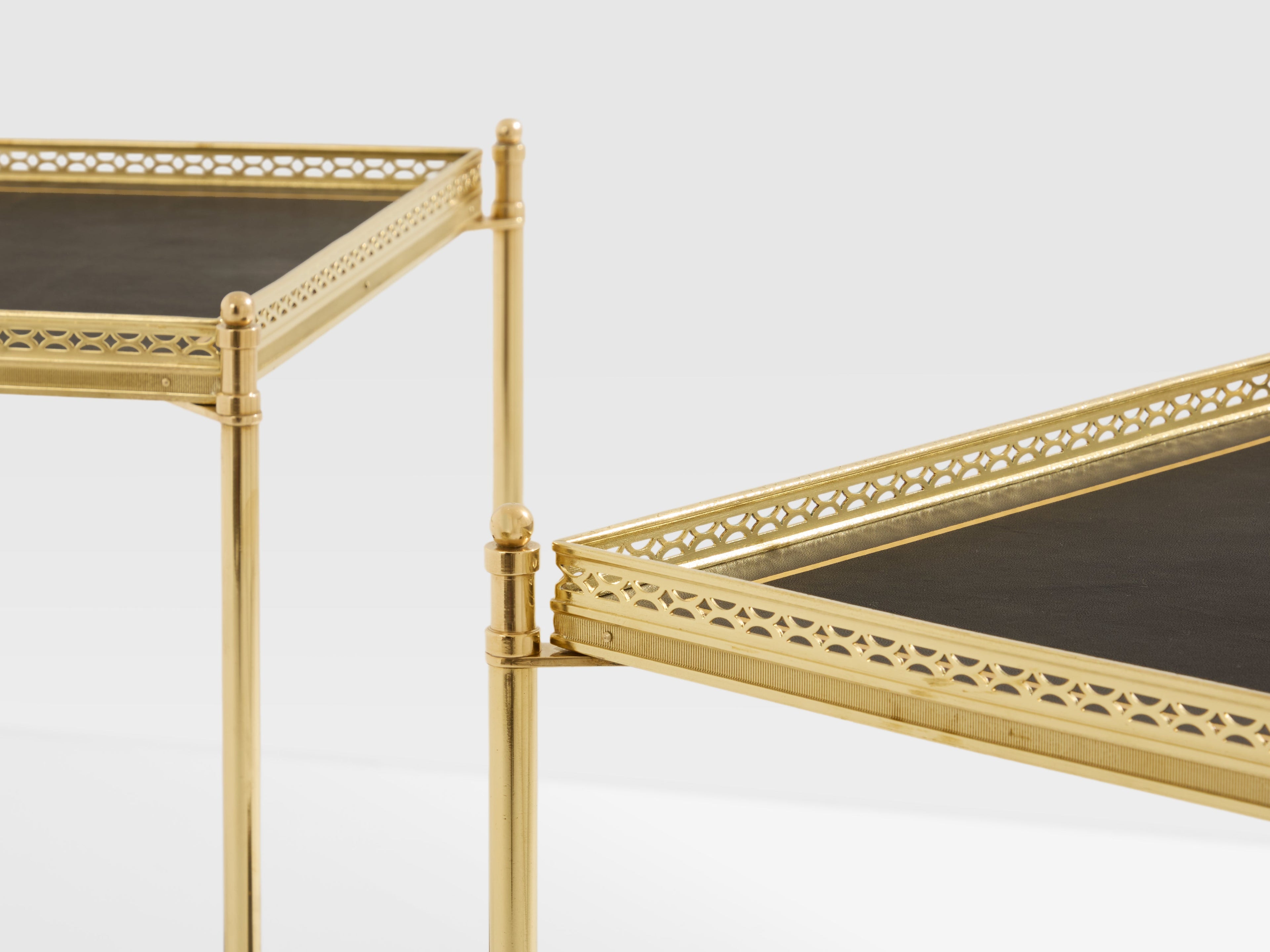 Maison Jansen pair of two-tier side tables brass black leather 1960s