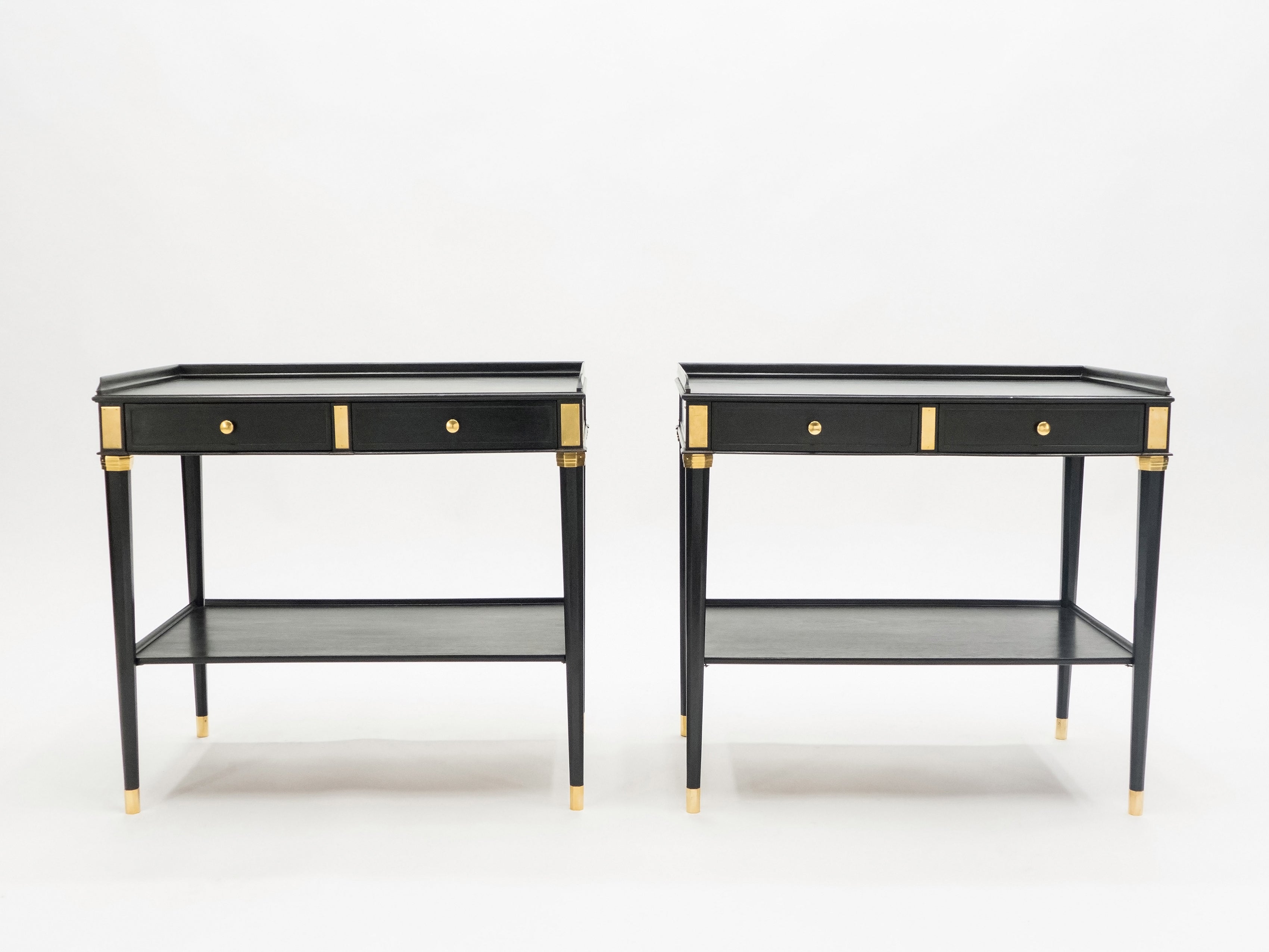 Rare Pair of stamped Maison Jansen black wood brass end tables 1950s