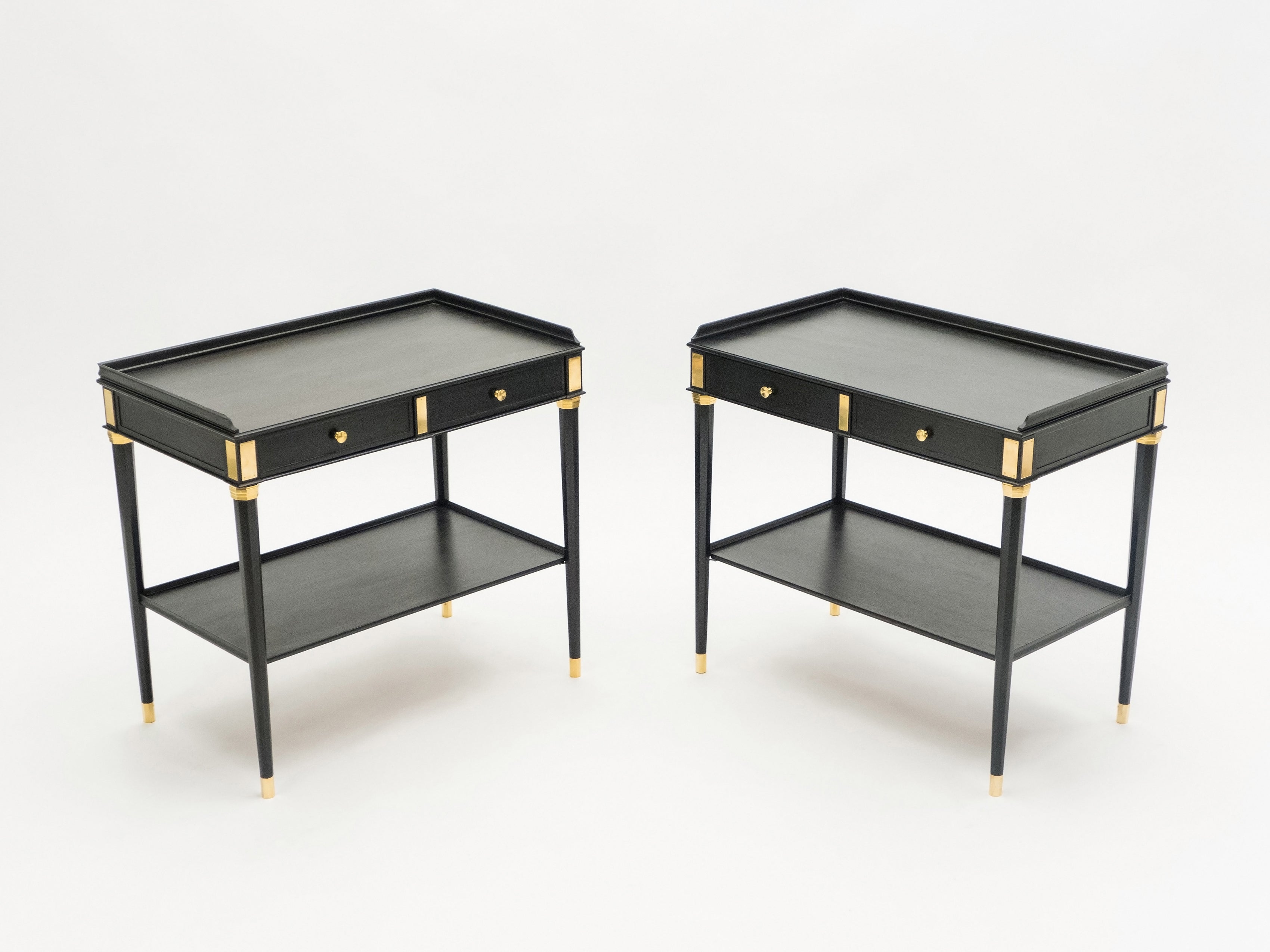 Rare Pair of stamped Maison Jansen black wood brass end tables 1950s