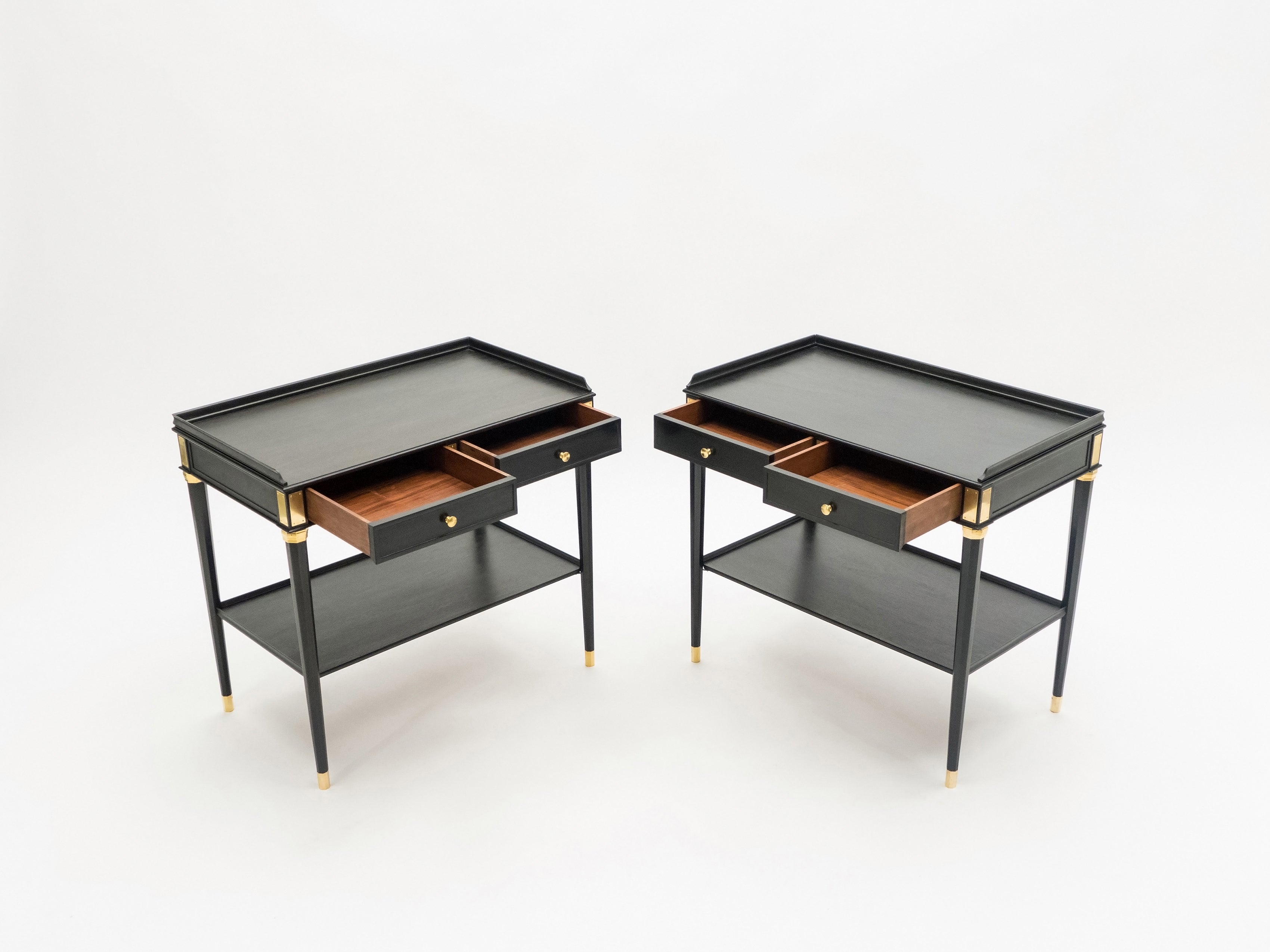 Rare Pair of stamped Maison Jansen black wood brass end tables 1950s