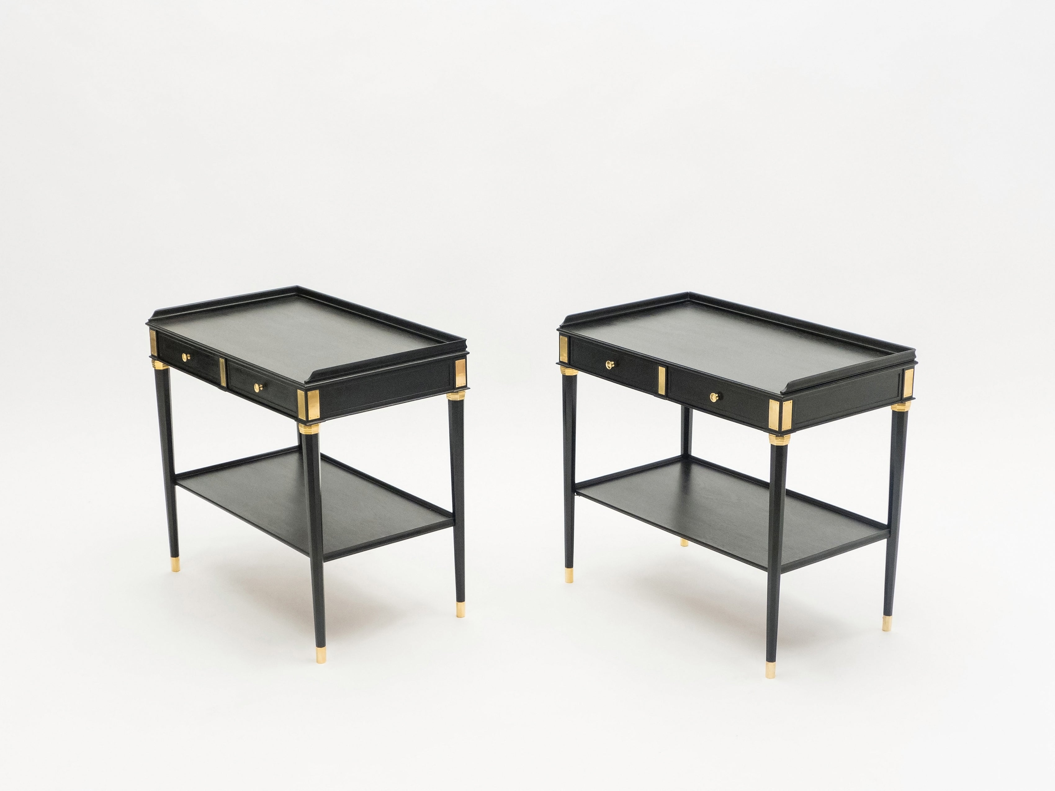 Rare Pair of stamped Maison Jansen black wood brass end tables 1950s