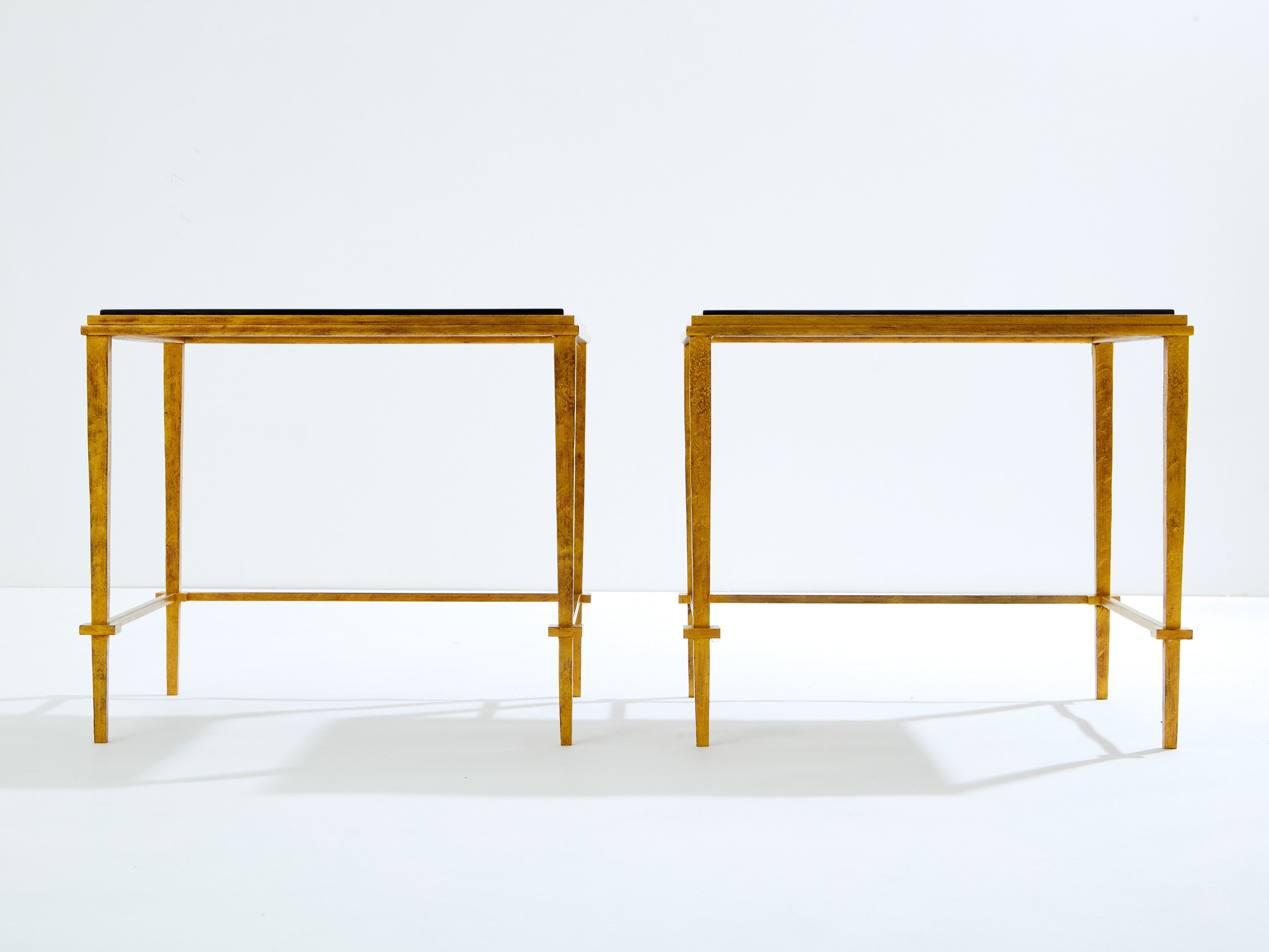 Pair of French Maison Ramsay end tables gilded iron black lacquer 1950