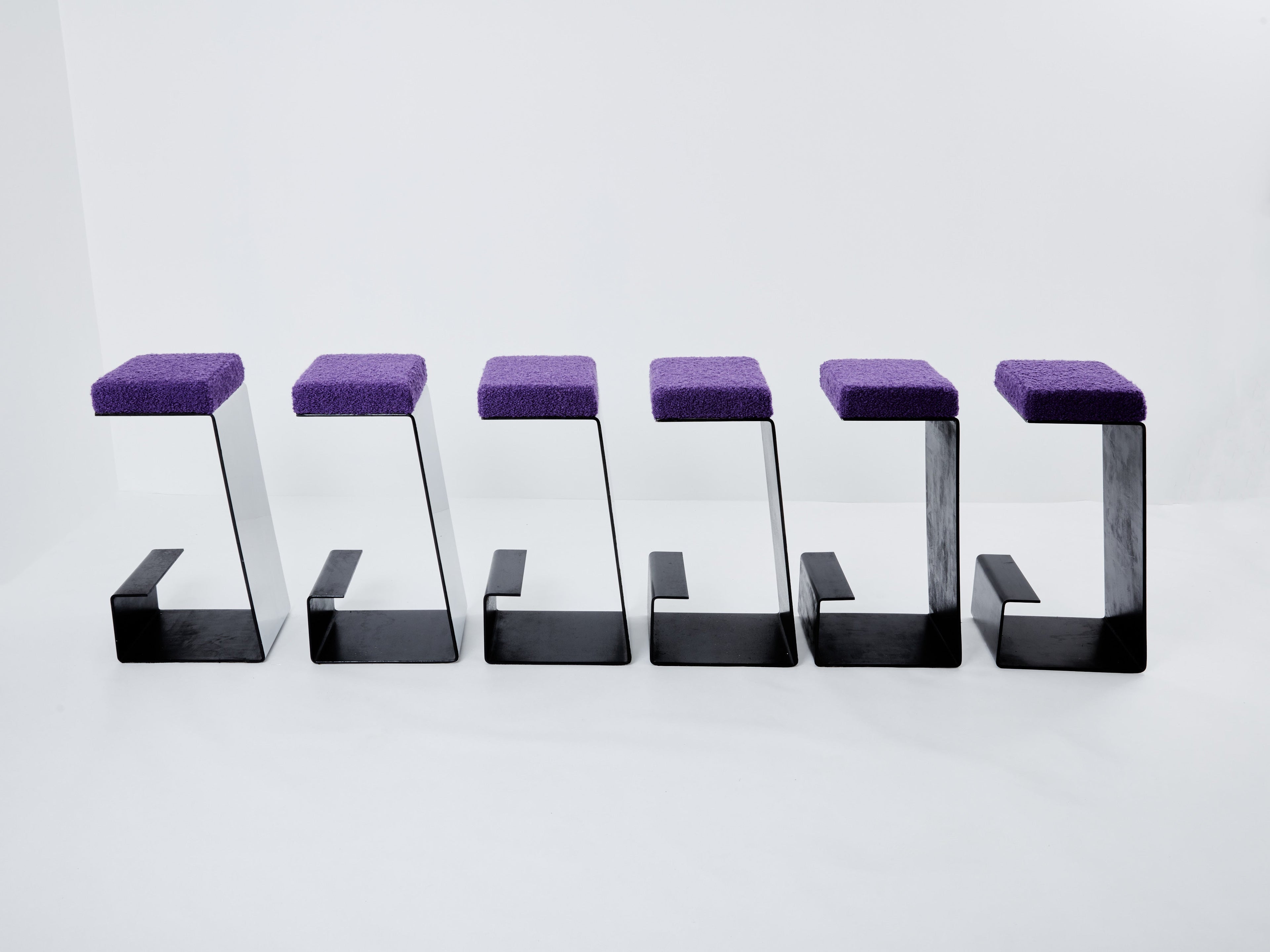 Set of six french wrought iron polished steel bouclé bar stools 1970s