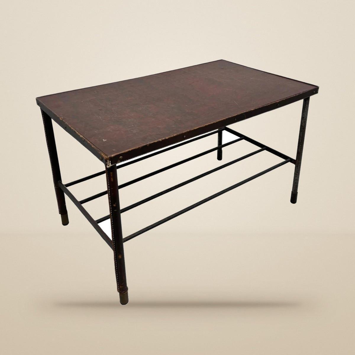 Coffee table by Jacques Adnet