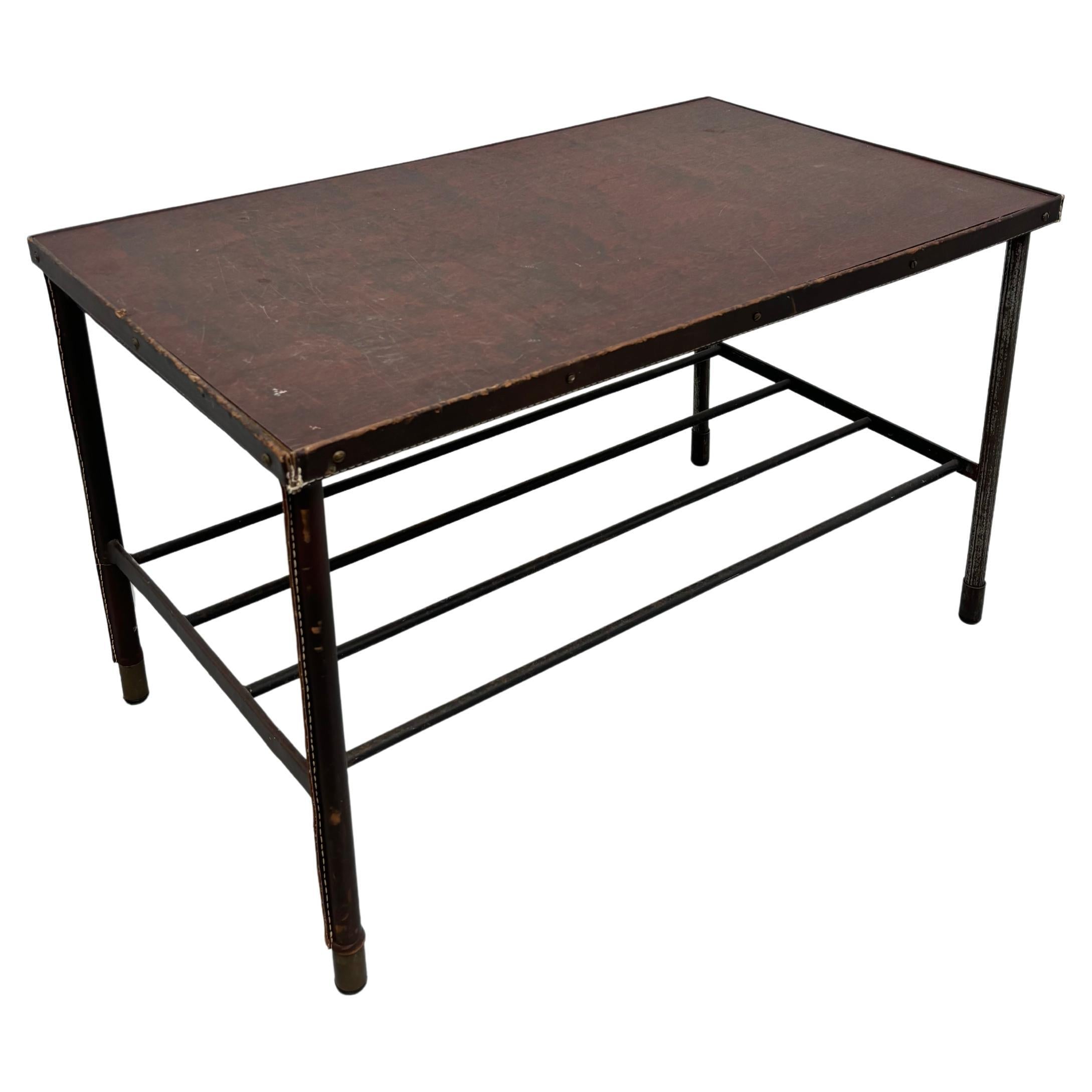 Coffee table by Jacques Adnet