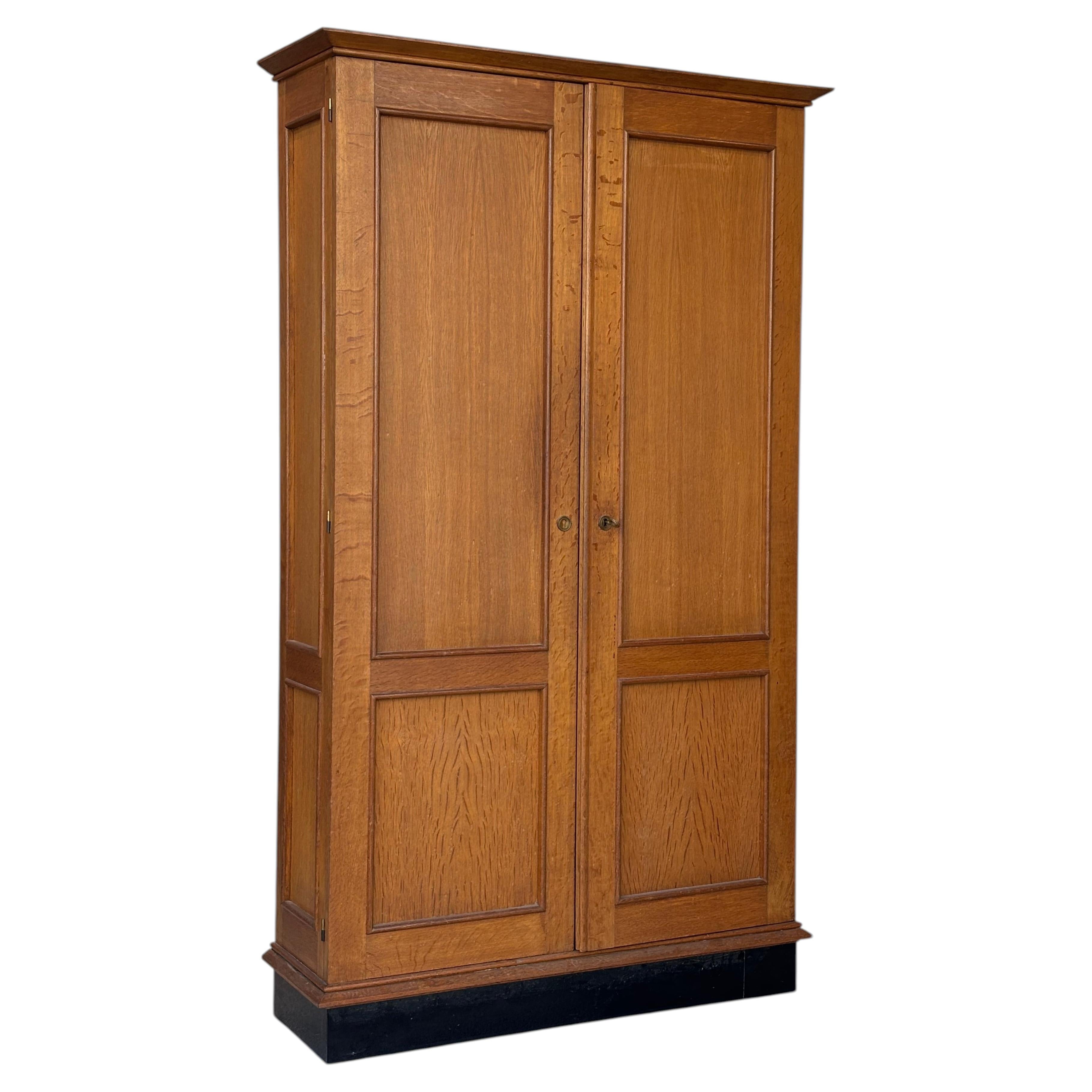 Jacques Adnet wardrobes in oak and formica circa 1950
