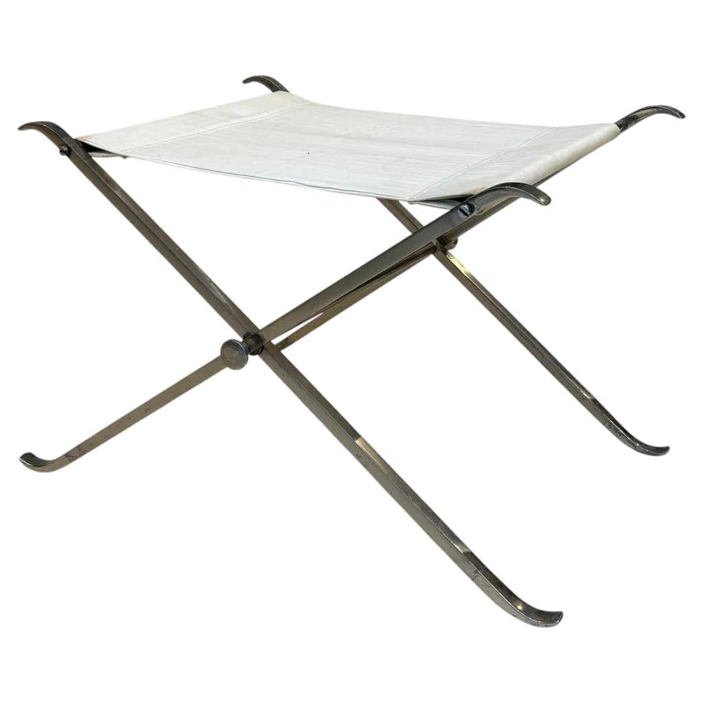 Stool by la maison Charles in stainless steel